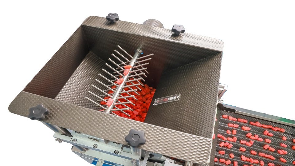 Teflon hopper and vibration track with a stainless steal stirring stick