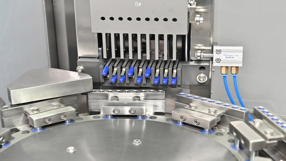Capsule feeding station